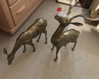 VERY TALL AND HEAVY BRASS FIGURINES SEVERAL SETS OF VARYING SIZES.