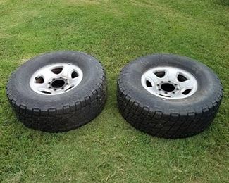 2 Nitto Terra Grappler All Terrain Tires and wheels - LT325/70R17