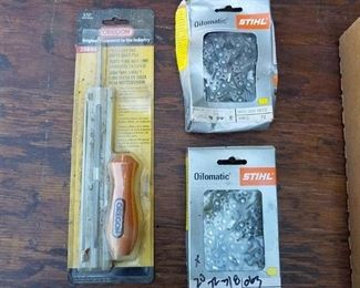 2 chainsaw chains and a file