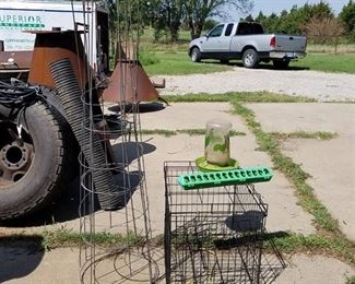 pet cage, chicken waterer and tomato cages