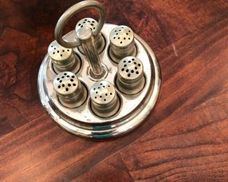 Antique Miniature 3 sets of Individual Salt &Pepper Shakers with Matching Caddy. Unique and ready for anyone’s cupboard. Very Nice.
