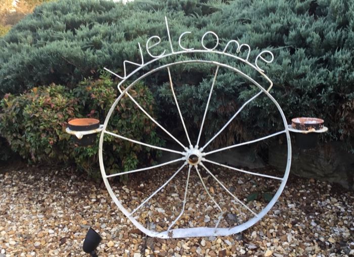 Welcome Entrance Wheel Sign.  All you need is a couple of plants and a visit. Everyone is Welcome to this sale.