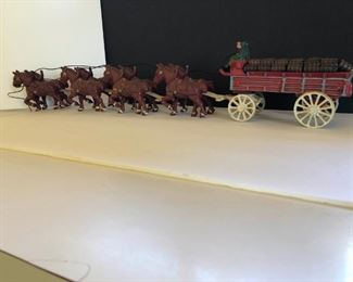 antique cast iron horses and buggy