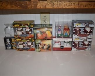 Assortment of brand new salt and pepper shakers