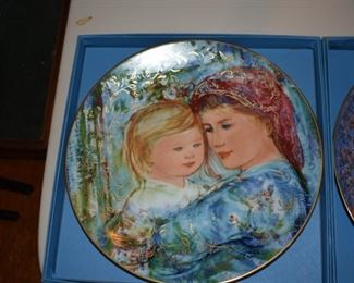 Many Hibel Mother's Day plates with boxes and certificates of authenticity