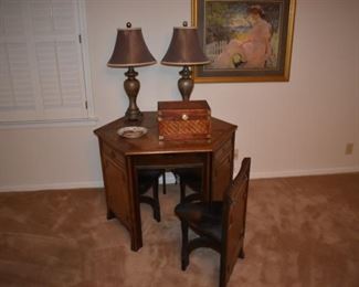 Very cool antique table and hide-away chairs