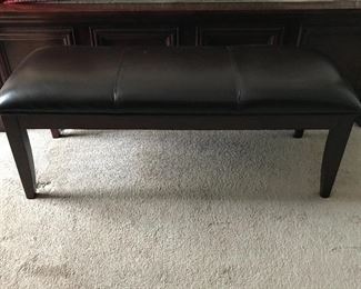 Leather bench fits perfectly at end of bed.