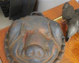 Cast iron pig head mold.