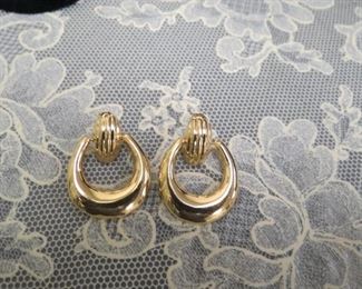 14k gold pierced earrings.