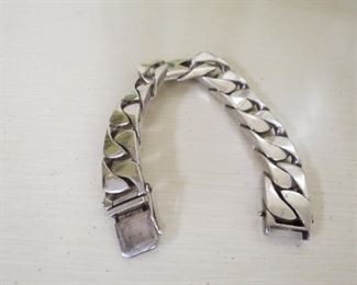 Men's sterling silver heavy curb bracelet.