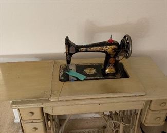 Great vintage piece take the machine out and use the cabinet. Or set them both up for display. I learned how to sew on one of these and it’s any entry Cabinet!