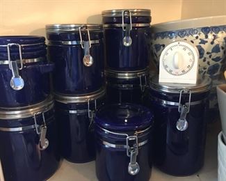 Set of cobalt blue canisters.