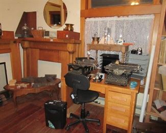 Oak student desk, old typewriters, oak mantle