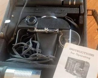 Vintage projector try purpose model AAA projector comes with detachable lens a case and a semi automatic slide changer includes instruction manual