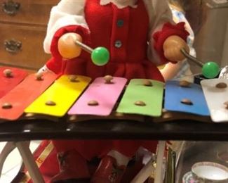 Vintage Doll Playing the Xylophone 