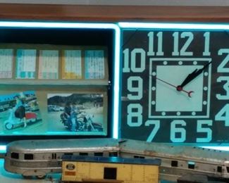 Vintage Action Ad Clock....display your favorite items in the rotating file