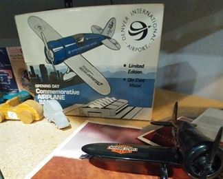 DIA limited edition opening day commemorative airplane bank and Harley Davidson airplane/literature