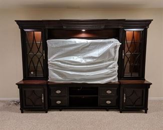 Large adjustable Aspen Home Entertainment Center. 65inch TV not included.