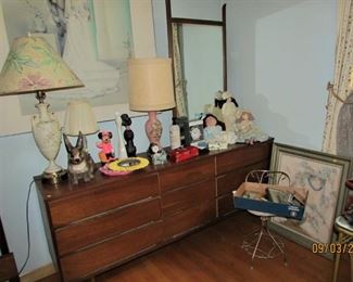 Large print on wall behind dresser not for sale