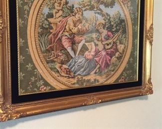 one of several framed tapestries