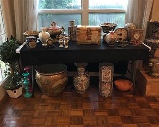 Lots of oriental vases, pots, bowls....