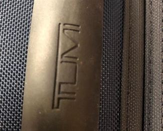 have 2 tumi large suitcases