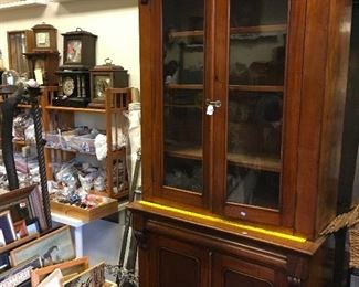 large antique two-piece cabinet