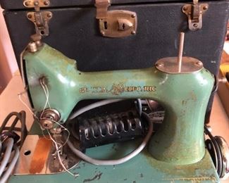 Antique General Electric Model A Sewing machine with attachments