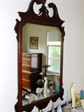 Mahogany framed mirror over dresser.