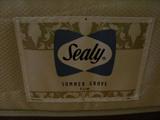 Details of Sealy twin bed mattress. Grade - firm. Near new, as purchased in 2010.