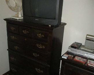 Bedroom dresser, television and fan