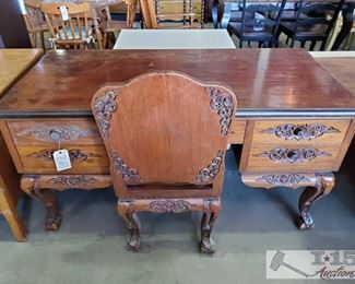 263: Antique Carved Wood Desk With Chair
Antique five drawer Carved Wood Desk With wood Chair
 