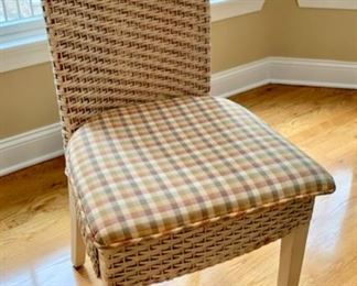 26. Six Rattan Cream Side Chairs (40" high)