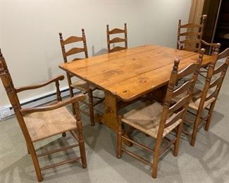 93. Pine Drop Leaf Dining Table w/ 2-10" Leaves (22" x 30" x 60")
94. Set of 8 Ladder Back Chairs w/ Rush Seat 2 Arm Chairs and 6 Side Chairs