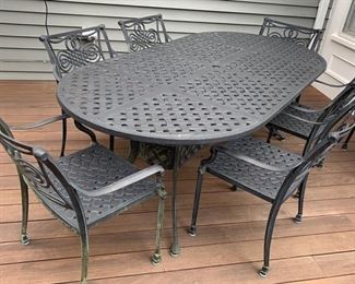 134. Cast Aluminum Oval Dining Table (85" x 42" x 29") w/ 8 Arm Chairs