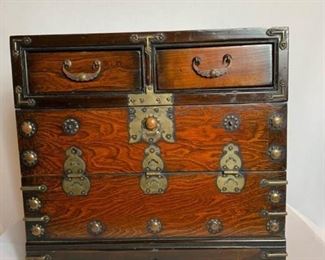 Decorative chest with brass accents. https://ctbids.com/#!/description/share/232081