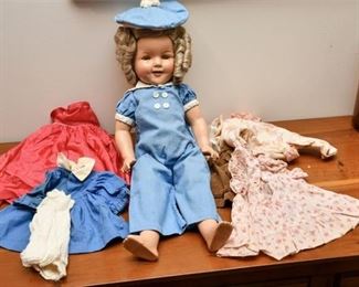 57. Antique Childrens Doll wClothing and Sleeper Eyes