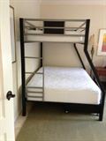 High quality bunk bed with rolling pull-out (under bed) storage!