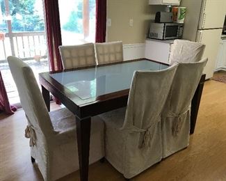 #4 Dining Table w/ leaf,  and Six Chairs $125
Matches Credenza/Media Console/Buffet