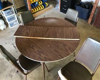 #27 Vintage Table Set with One Leaf and Four Chairs $20
Chairs need to be recovered. The set is sturdy.