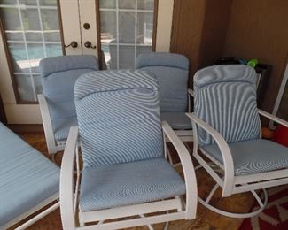 Set of 4 Rocker/Swivel chairs with cushions