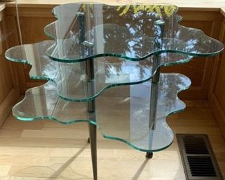 Scalloped edge glass table