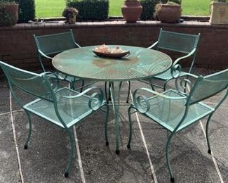 Wrought iron round table and 4 chairs
