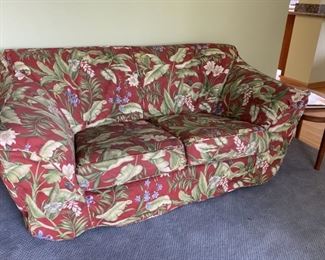 Love Seat Italian leather with custom high end upholstery.
