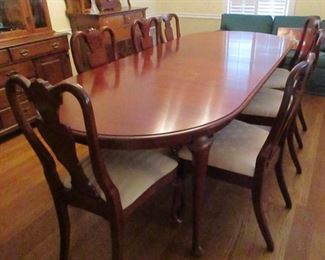 cherry dining room table and chairs