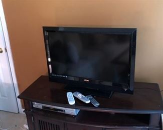32" flat screen tv and American Singature Tv Stand