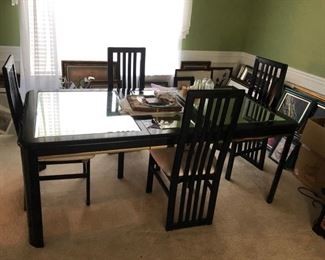 Mirrored dining table with leaf.  Has matching mirrored buffet