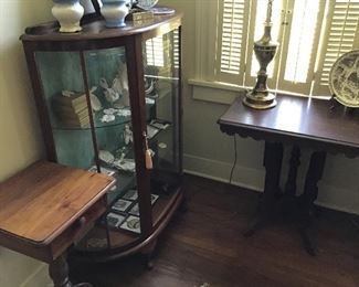 Convex glass China cabinet and side table