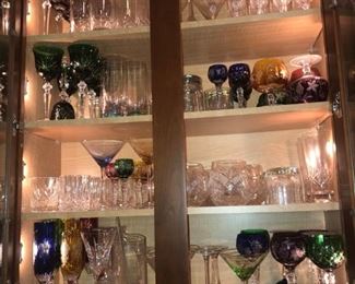 LARGE ASSORTMENT OF CUT CRYSTAL STEMWARE ALL WITHOUT DAMAGE - BOTH CLEAR GLASS & MULTI-COLORED  STEMWARE ALSO