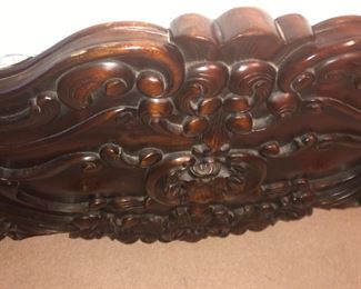 CLOSE UP VIEW OF ORNATE CARVED CENTER PIECE CLOSE UP VIEW OF HIGHLY CARVED ROCOCO FLORAL MAHOGANY KING SIZE BED WITH NEW CUSTOM MATTRESS